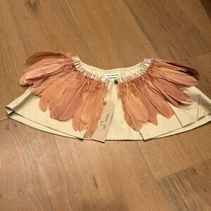 Tan/rust feathered cape! Brand new with tags. Absolutely stunning.